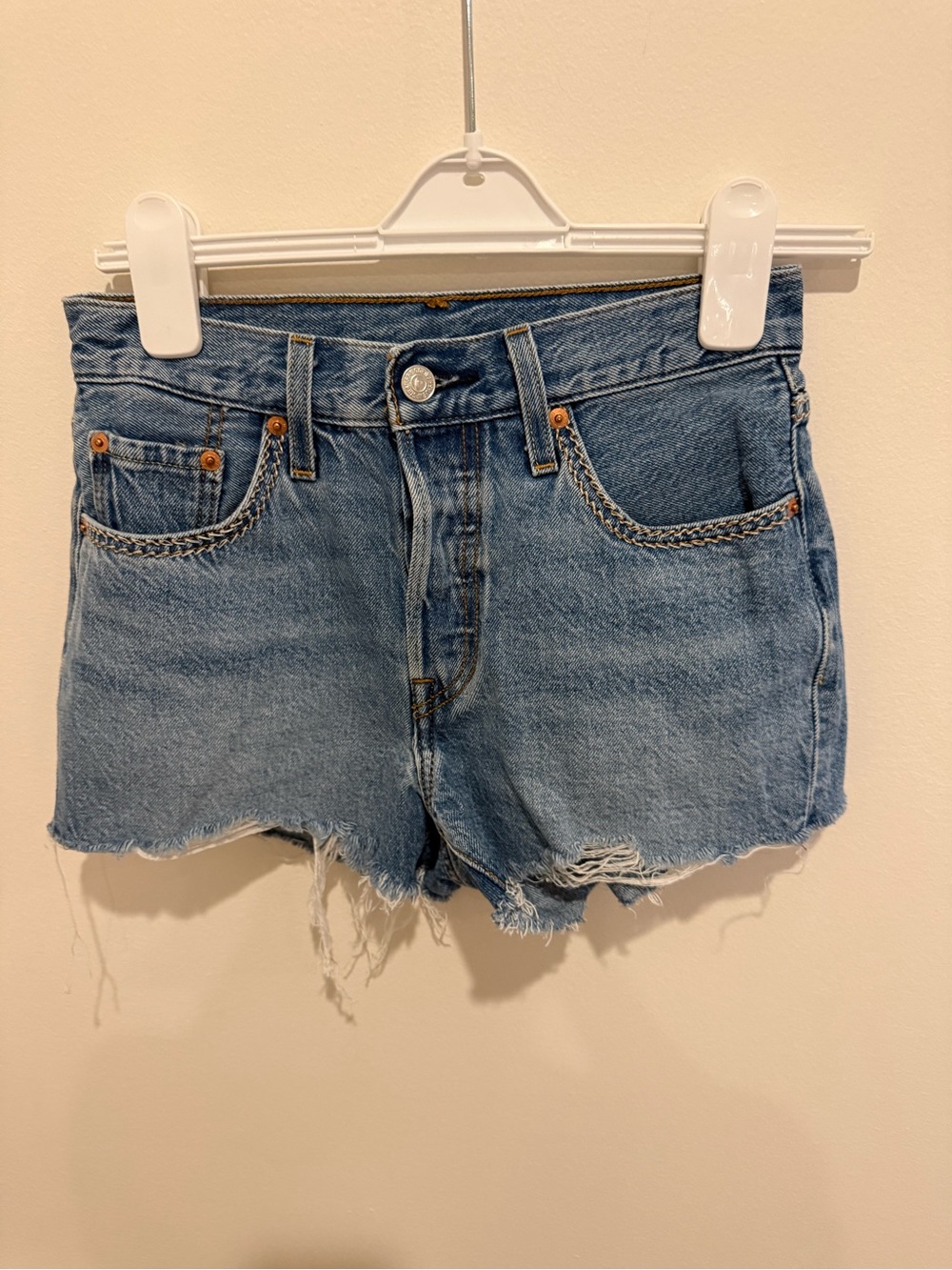 Levi's Medium Blue Distressed Denim Cutoff Shorts